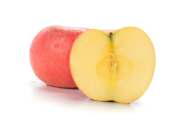 Red apple and slice on a white background