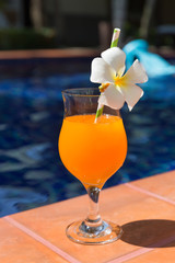 Orange mango fresh juice smoothie drink cocktail slippers near s