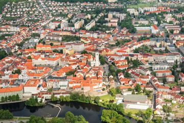 Colorful aerial view on medieval Town Pisek above the river Otava, Czech Republic