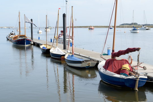 Sailing boats in Wells-next-the-sea harbor, Norfolk, England