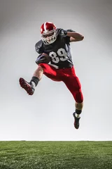 Tuinposter The american football player in action © master1305