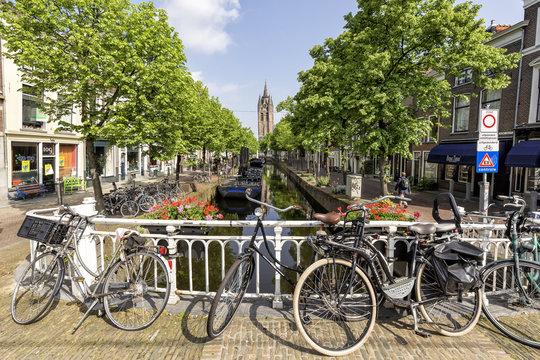 Canal in the center of delft with the classic bike