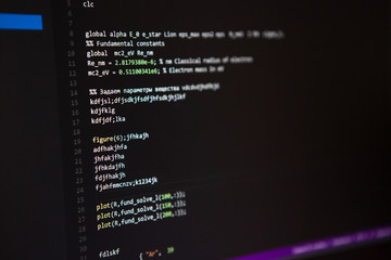 programming code on the screen. Perspective. Shallow depth of fi