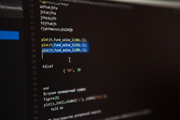 programming code on the screen. Perspective. Shallow depth of fi