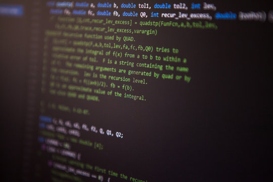 programming code on the screen. Perspective. Shallow depth of fi