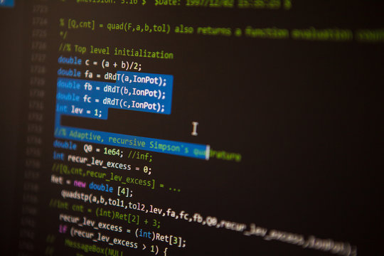 programming code on the screen. Perspective. Shallow depth of fi