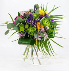 Colorful flower bouquet arrangement centerpiece in vase
