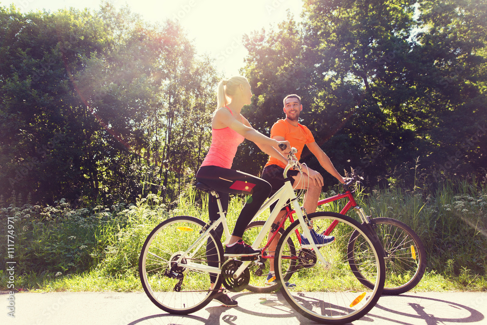 Canvas Prints happy couple riding bicycle outdoors