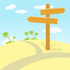 Wooden signpost at crossroads in desert