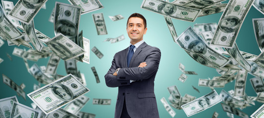 happy businessman over dollar cash money rain