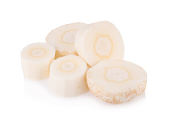 Fresh parsnip roots on a white background