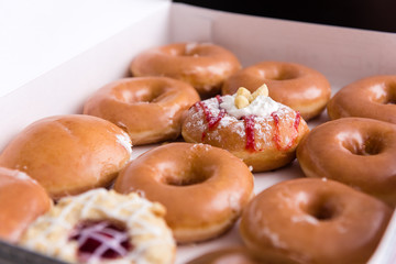 A dozen of fresh donuts
