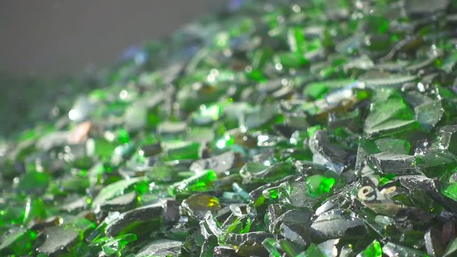 Sorting cullet. Glass recicling. Renewable production. Super slow motion