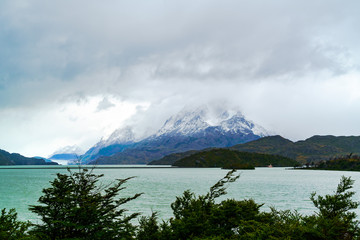 View of Gray Lake and Gray Glacier with the snow mountain in rainy day
