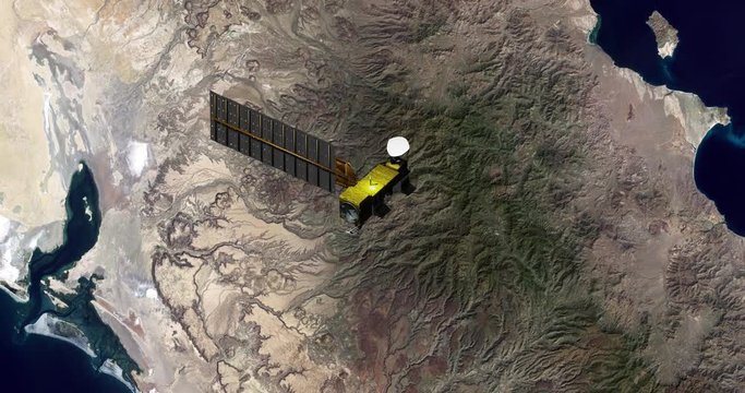 Top view of Earth-observing Aqua spacecraft in orbit above the Baja Peninsula. Data: NASA/JPL.