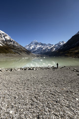 Lonely photographer enjoying his time surrounded by beautiful landscape.