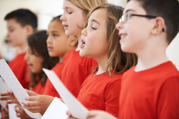 Group Of School Children Singing In Choir Together © highwaystarz