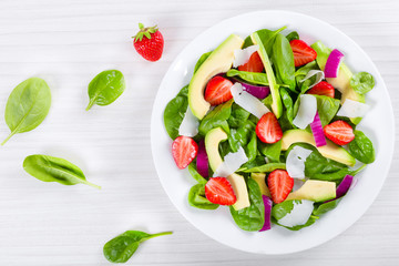 Strawberry,  baby spinach, red onion,  goat cheese and avocado s