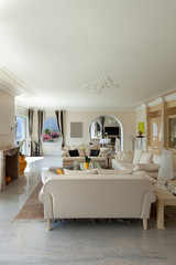 Living room, confortable white divans
