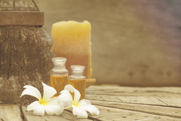 Frangipani, oil and Candle. Spa concept with warm tone