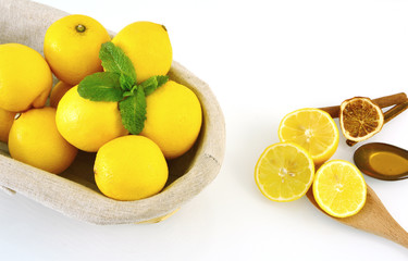 Mint,Lemon and honey is a healthy drink .
colorful of lemons.