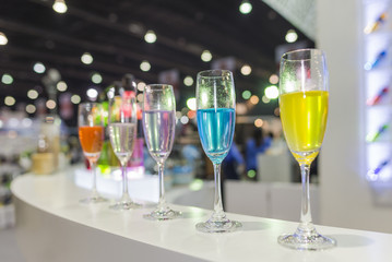 A glass of colors sweet carbonated drinks