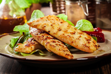 Grilled chicken breasts served with grilled paprika
