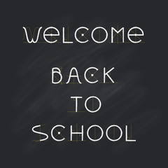 Obraz premium Welcome Back to school, chalk letters on black chalkboard