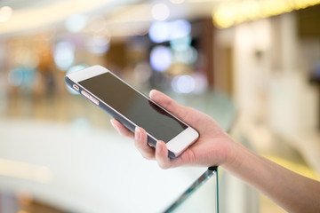 Woman holding on cellphone