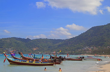 Fototapeta na wymiar colorful boats on the shore, Patong beach