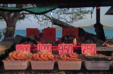 shrimps, oysters and other seafood on the street market, Phuket island - 111789184