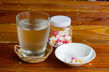 Colorful medical pills, tablets, capsules or supplements for the