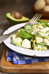 Rustic salad with avocado,boiled eggs,spinach and chicken.