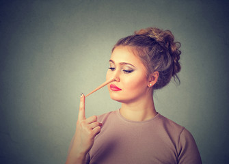 Obraz premium Woman with long nose. Liar concept. Human face expressions, emotions, feelings.