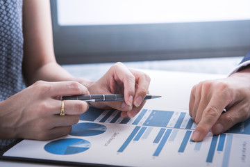 Business people discussing the charts and graphs showing the res