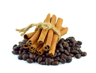 Coffee beans and cinnamon sticks.
