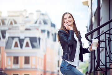Fototapeta premium Modern young woman in a big city