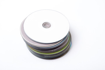 Compact discs in a pile