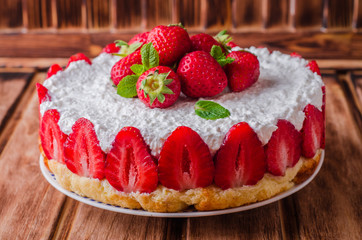 no baked Strawberry Cheesecake with cottage cheese on wooden background, selective focus.