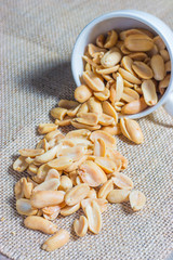 peanuts with salt in white cup
