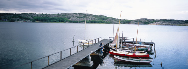 Boats moore to a jetty.
