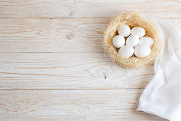 Wooden background with eggs