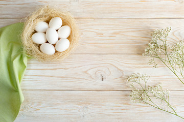 Wooden background with eggs