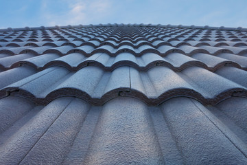 Fototapeta tile roof with blue sky obraz