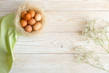 Wooden background with eggs