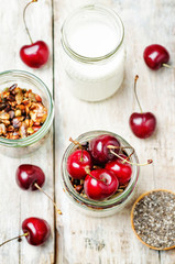 Chia seeds granola Greek yoghurt pudding with cherries