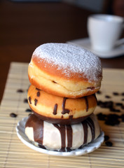 Homemade Donuts With Chocolate And Sugar On A Plate 