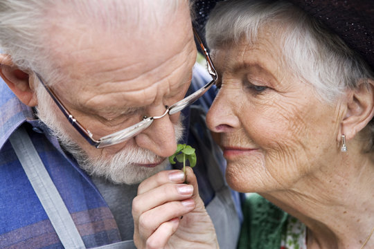 An elderly scandinavian couple with basil, Sweden.