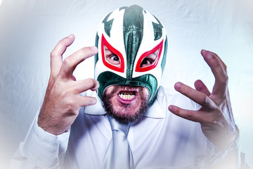 angry businessman with Mexican wrestler mask, expressions of ang