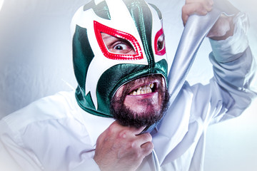 angry businessman with Mexican wrestler mask, expressions of ang